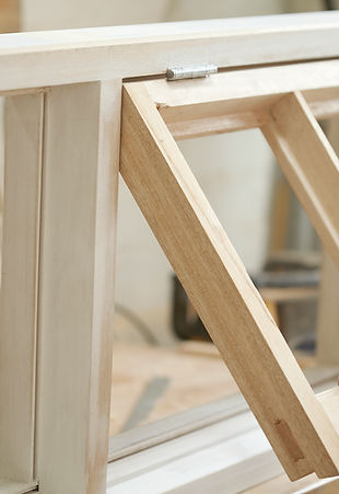Carpenter Assembling Newly Made Windows