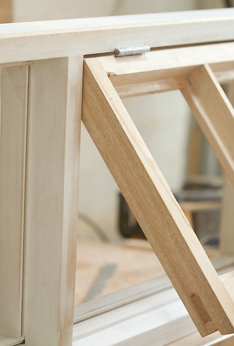 Carpenter Assembling Newly Made Windows