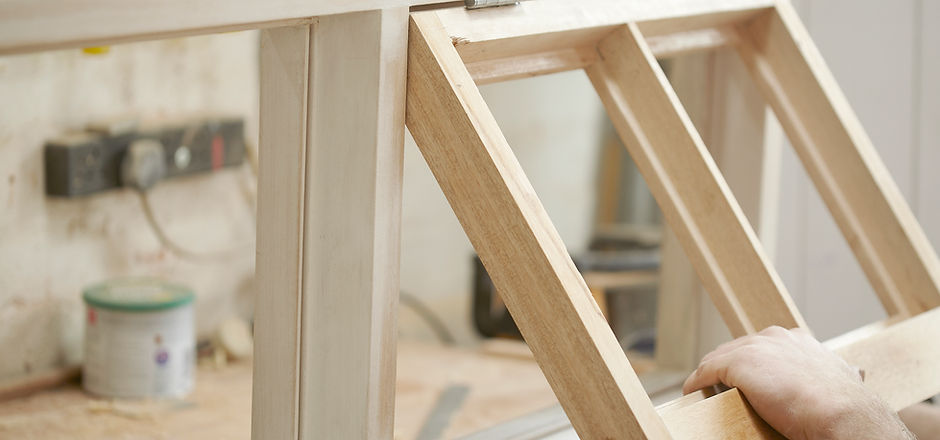 Carpenter Assembling Newly Made Windows