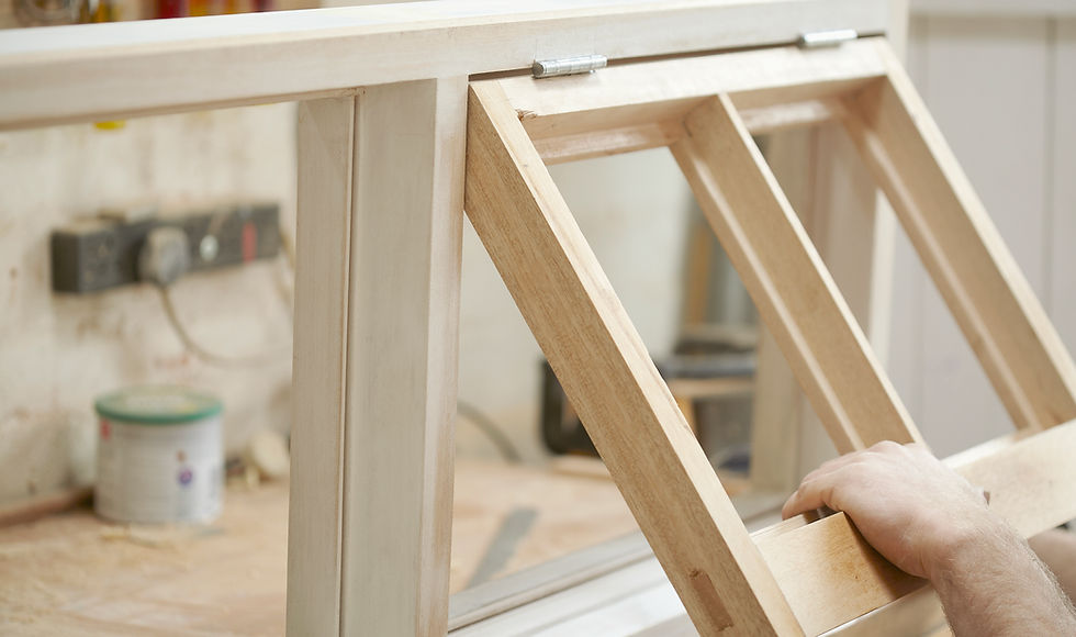 Carpenter Assembling Newly Made Windows