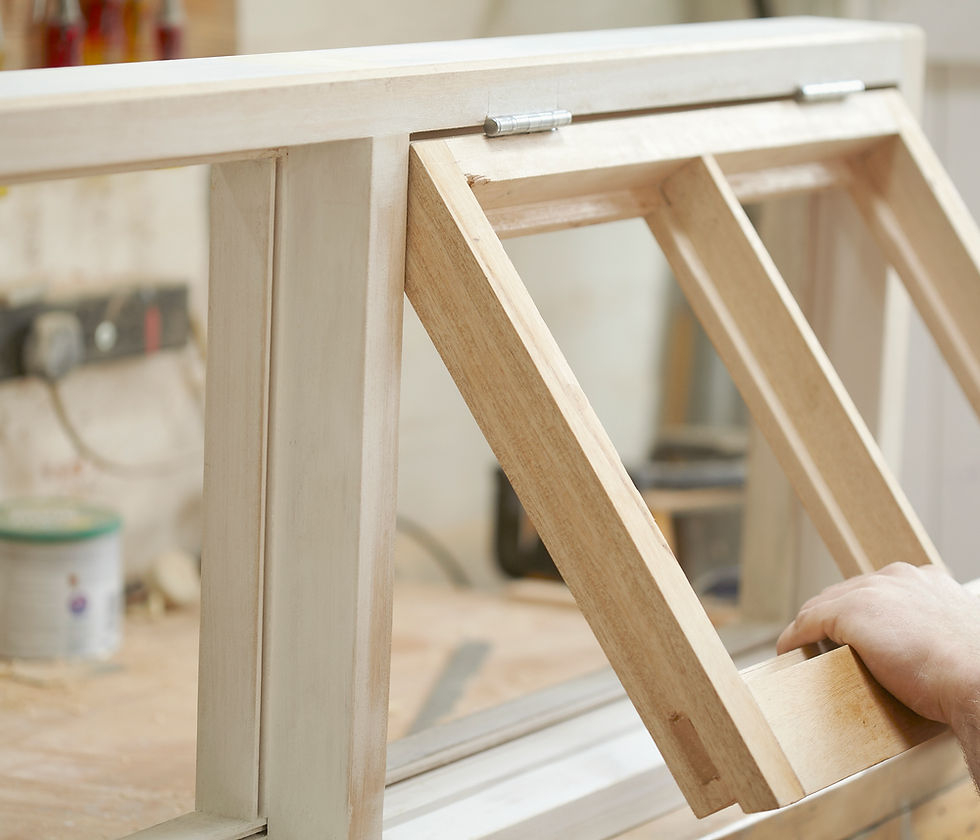 Carpenter Assembling Newly Made Windows
