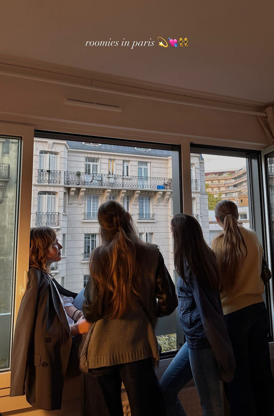roommates looking out the window together
