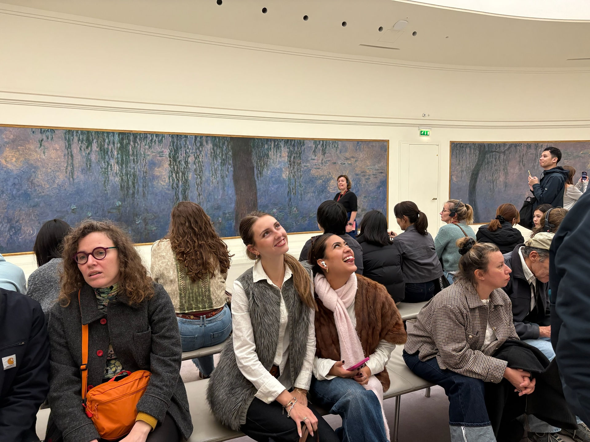 students looking at art in a museum