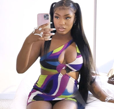 Ivorian Doll Wearing our Hand jewel