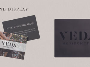 Minimalist display of business cards and a black box.