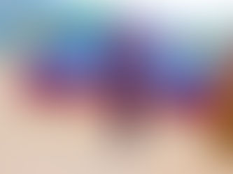 Young learners smiling and engaging in early‑childhood lessons at New Generation Transformative School.