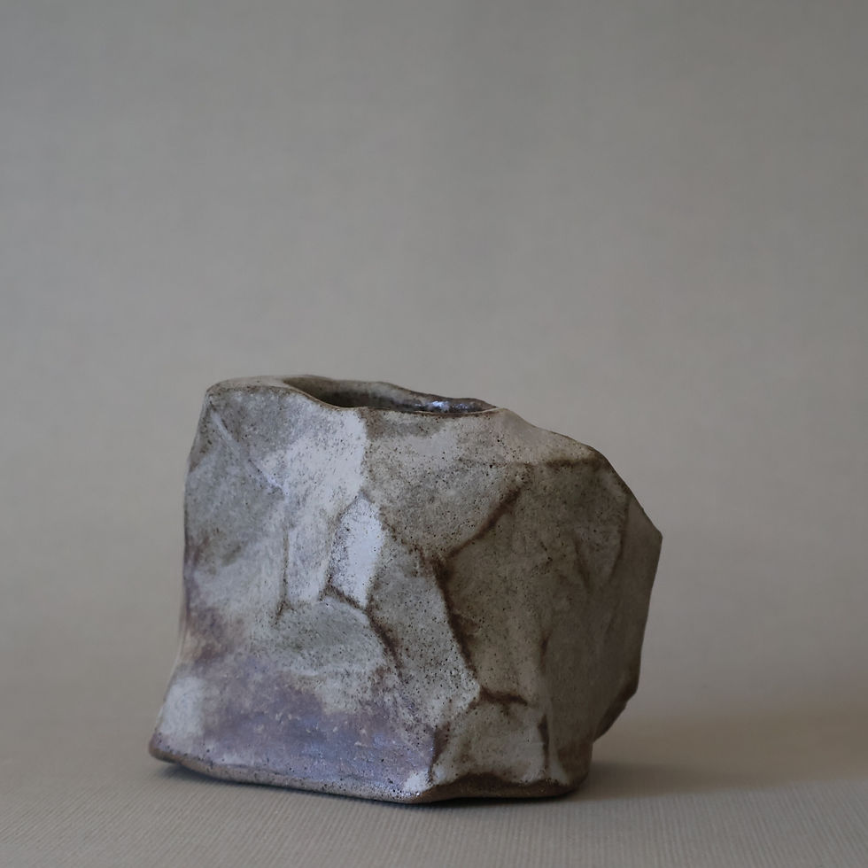 Thumbnail: Ribbed gray stone vase
