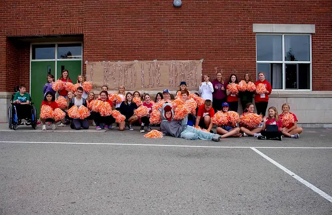 Crossroads-Caring-Coyotes-Club-gets-ready-to-cheer-on-their-school-for-the-annual-school-d