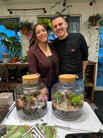 Couple Posing with built Terrariums 