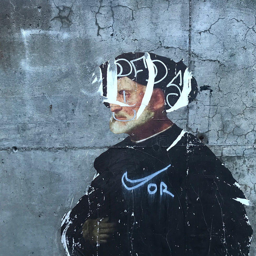 Torned Poster on Concrete Wall