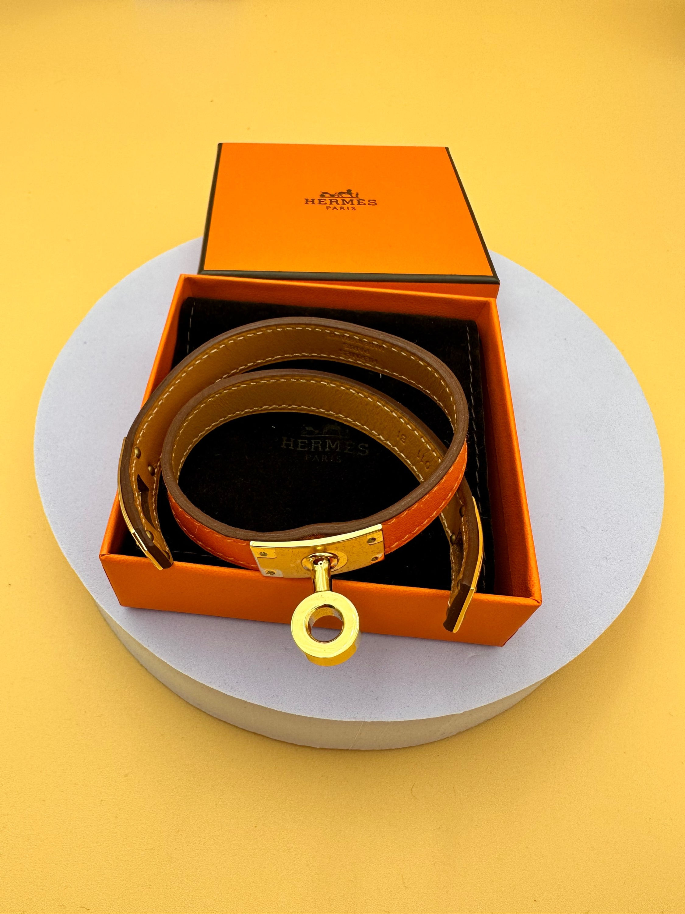 HERMÉS KELLY IN ORANGE GOLD HARDWARE