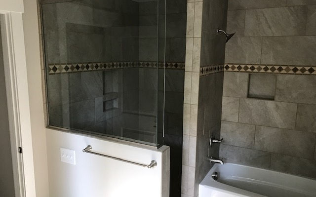 Walk in shower built by R&R Custom Builders.