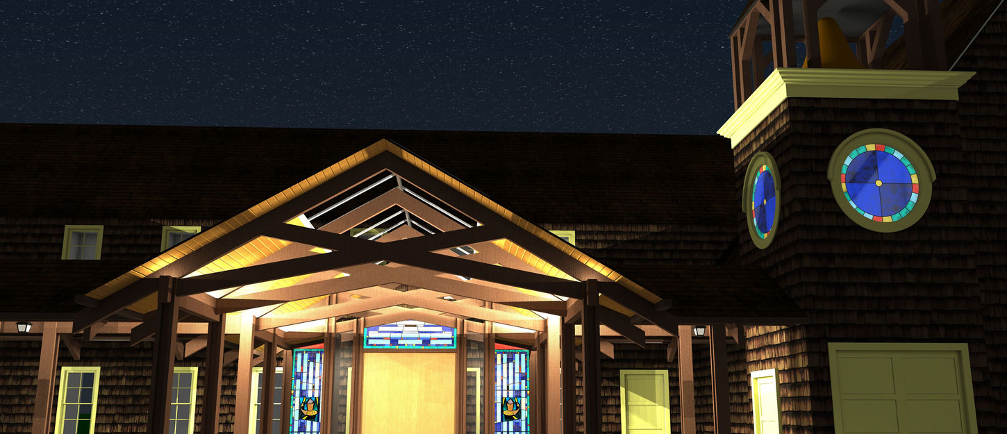 Night view of the illuminated entry canopy at Church in the Wildwood.
