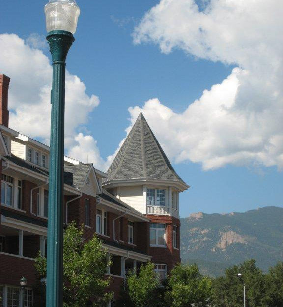 Scenic mountain view from balcony or window within multifamily neighborhood