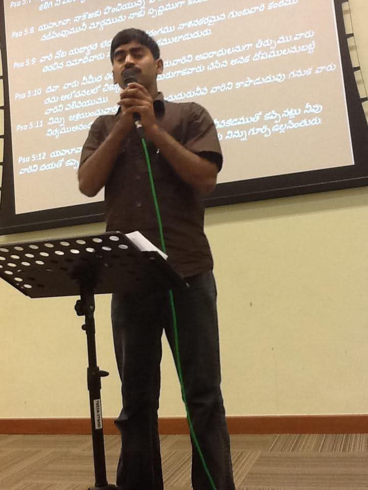 Sharing his testimony after his baptism.