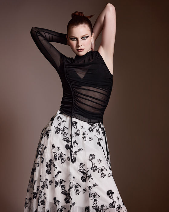 Nadia Louise, editorial fashion portrait, high fashion model, beauty portrait, dramatic makeup, couture styling, studio fashion photo, fashion portfolio, model portfolio, editorial beauty image, artistic fashion photography, dramatic pose, runway-inspired portrait, designer fashion look