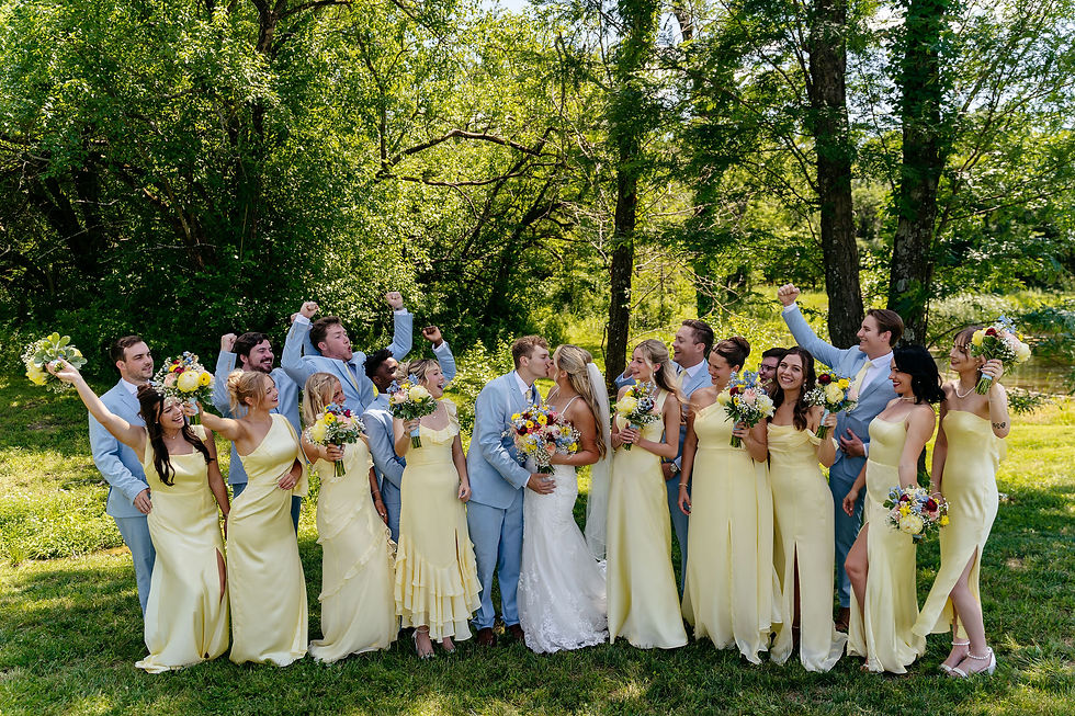 Wedding party celebrating after the ceremony at Stone Briar Farm.