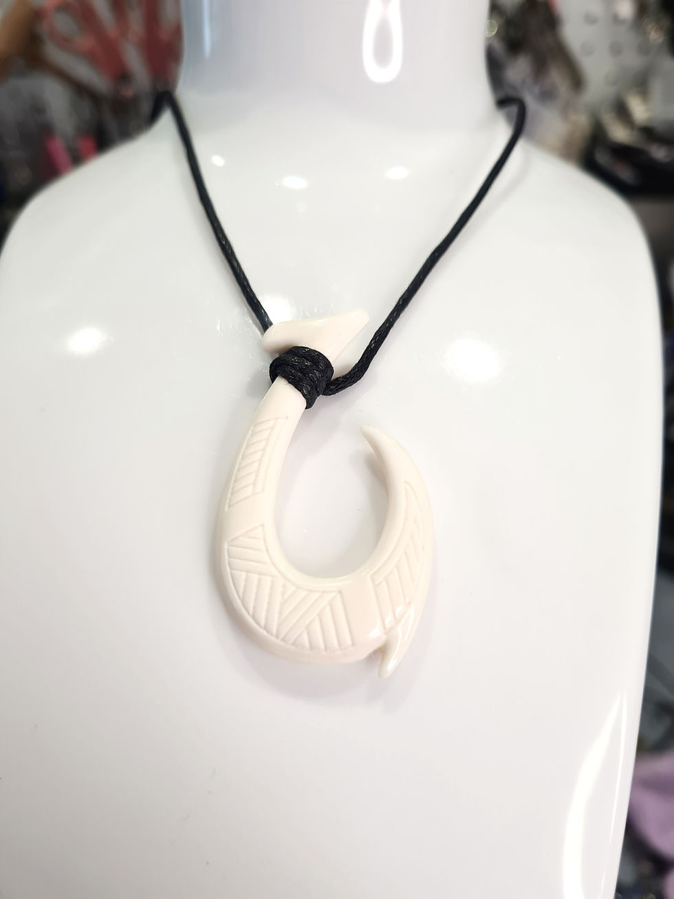 縮圖：Pendentif “Hei Matau”, le crochet