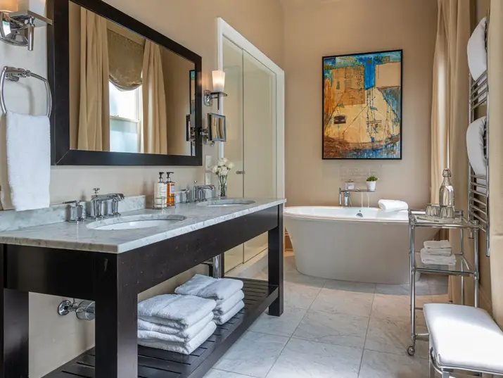 Luxury guest room with elegant furnishings at Stonehurst Place boutique inn in Atlanta