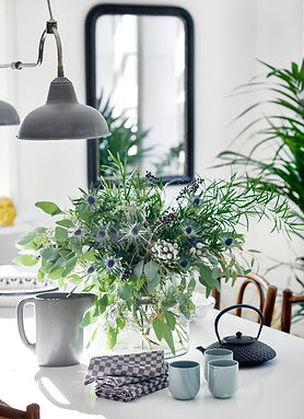 Table with lamp and plants