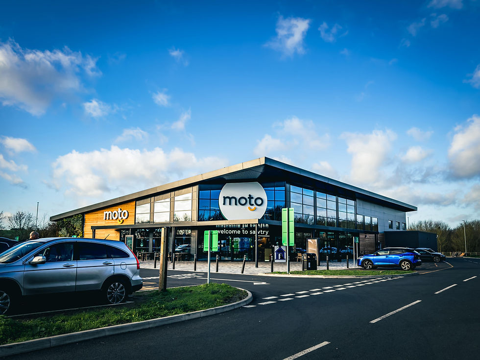 Moto Hospitatlity Sawtry motorway services taken from the car park looking at the entrance of the building