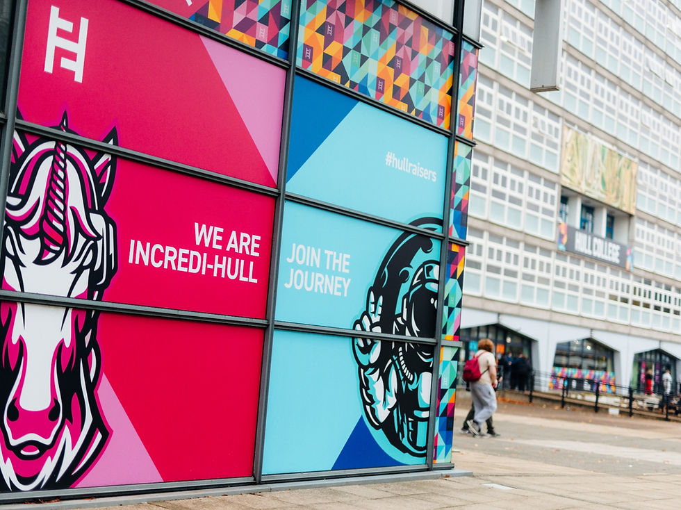 Hull College building with "WE ARE INCREDI-HULL" and "JOIN THE JOURNEY" murals.
