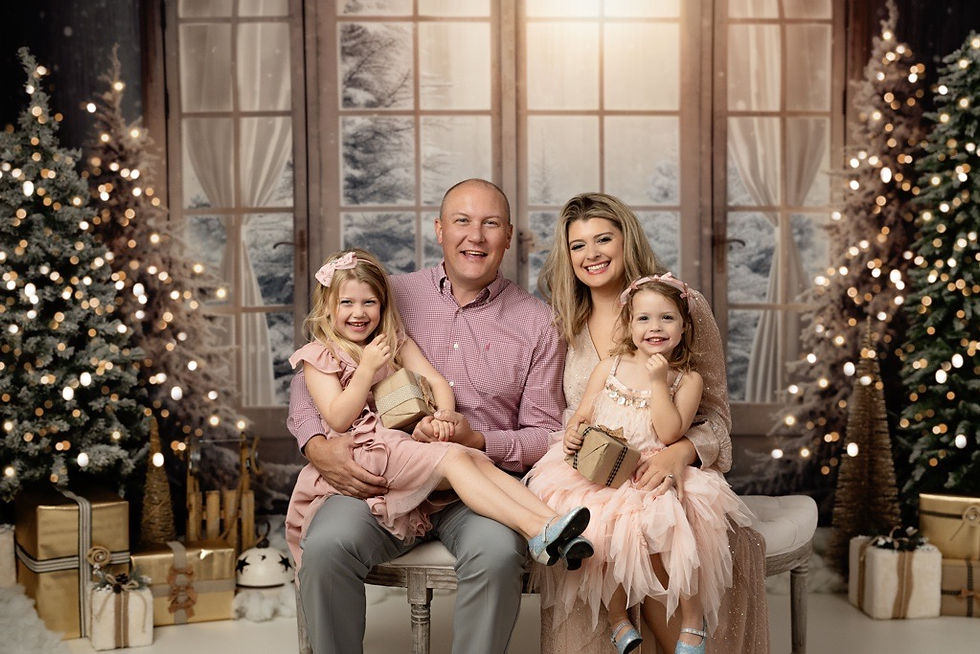Family gathered in a professionally decorated Christmas room