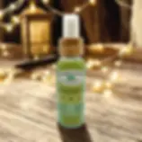 Glamper Camper Wonder Bug Repellent spray in eco-friendly aluminum bottle with bamboo cap, displayed on rustic wood table.