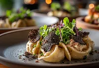 vecteezy_gourmet-pasta-with-truffle-shavings-and-microgreens_60378926.webp