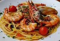 vecteezy_seafood-spaghetti-featuring-prawns-shellfish-and-zucchini_49729765.webp