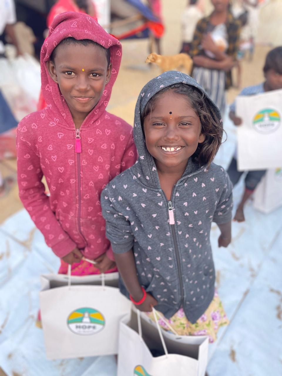 Children happy after receiving gifts