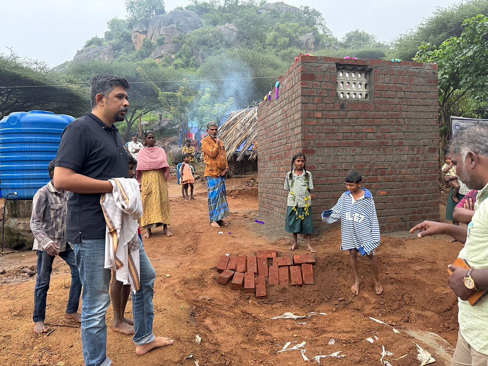 Completed toilet units improving hygiene, dignity, and quality of life for tribal families — a sustainable rural development and toilet construction project by Paalam Trust under a CSR initiative in India.