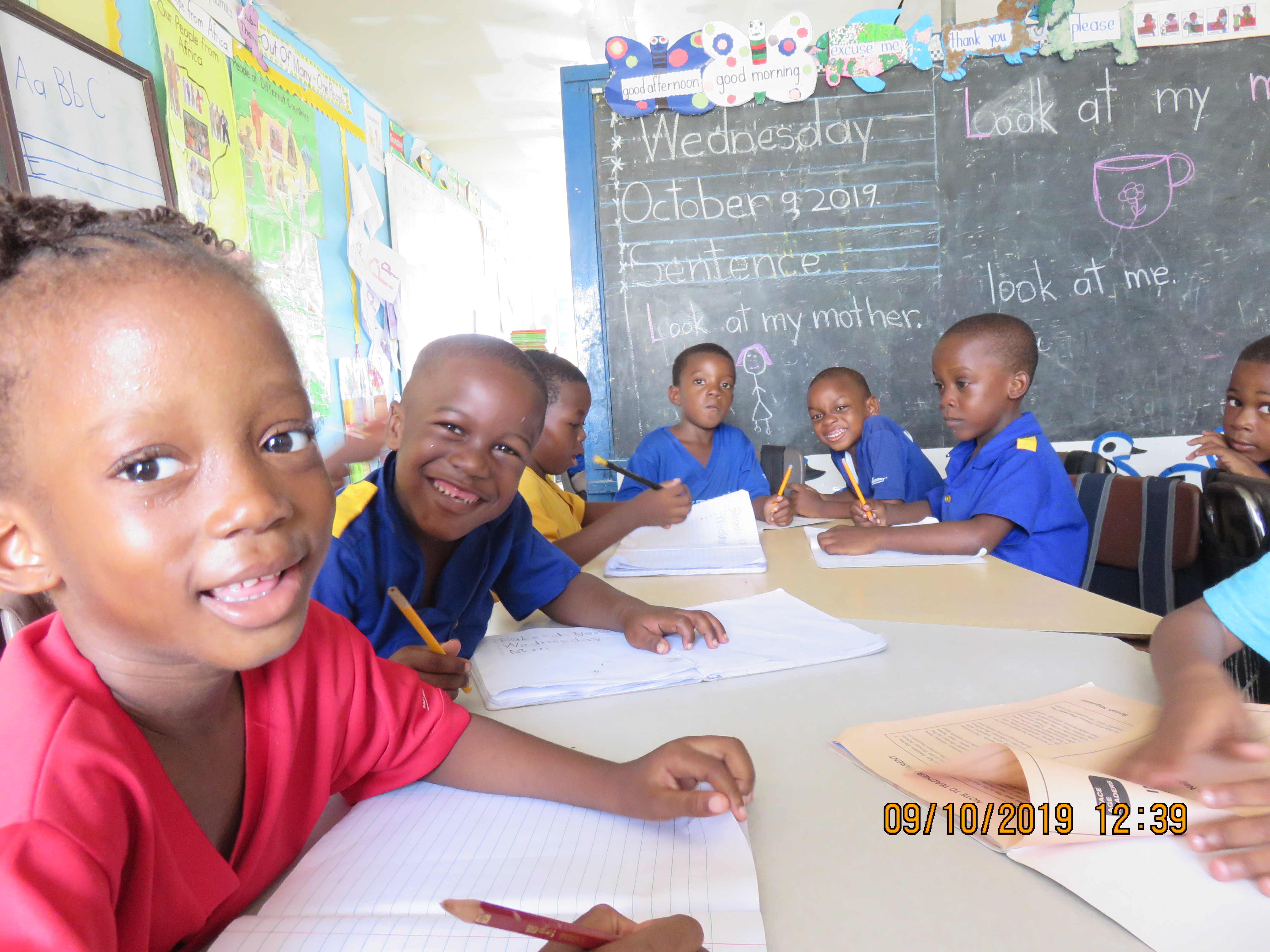 Students working in a classroom supported by Integrity Children's Fund