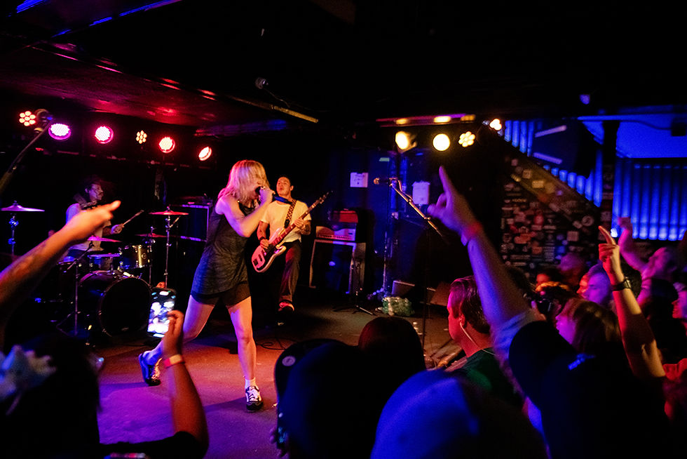 A photo of the band Winona Fighter playing onstage at the Subterranean in Chicago