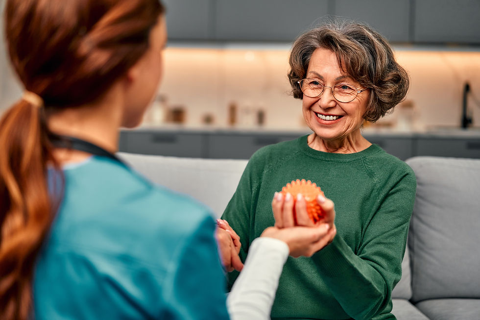 SMARTPHYSIO home visit physiotherapist treating a patient in their London home