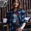 Thumbnail: Red Torpedo Acid Punk Women's Black Tee Front Design casual look with flannel
