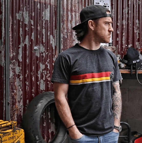 Lee Johnston Wearing Red Torpedo Heritage 66 Men's Anthracite Tee Showing Front Stripe Design