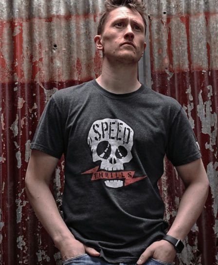 Dean Harrison Wearing Red Torpedo Speed Head Men's Anthracite Tee Showing Front Design