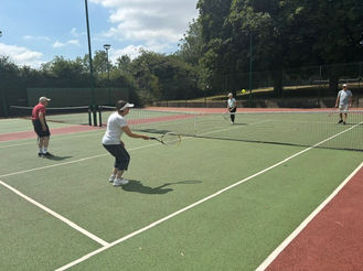 people playing walking tennis