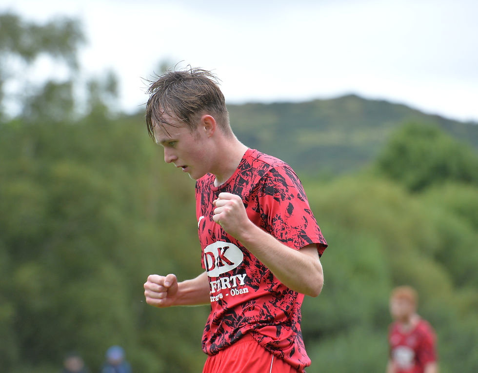 Rhys Millar wheels away in celebration after netting Saints' second goal