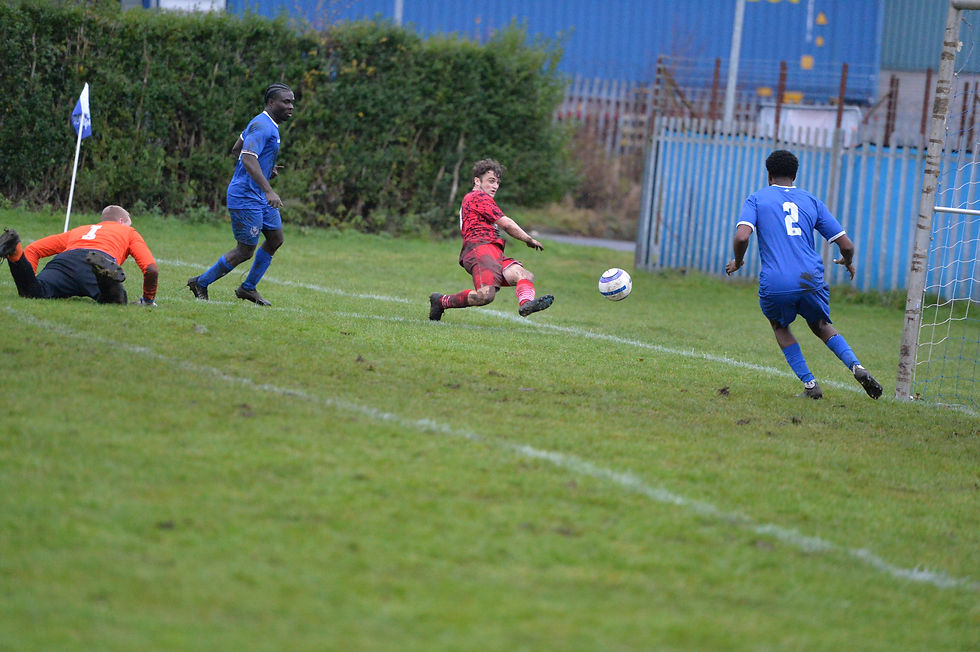 David Icharia blocks David Beaton's effort on the goal line