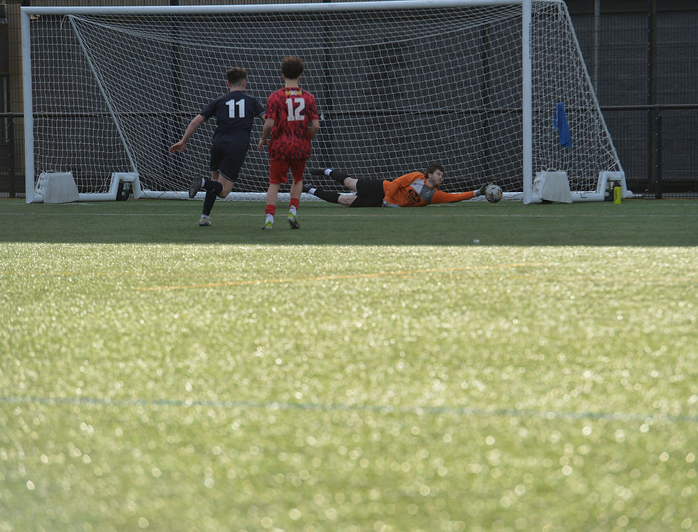 Craig Maitland saves Adam Jamieson's free kick
