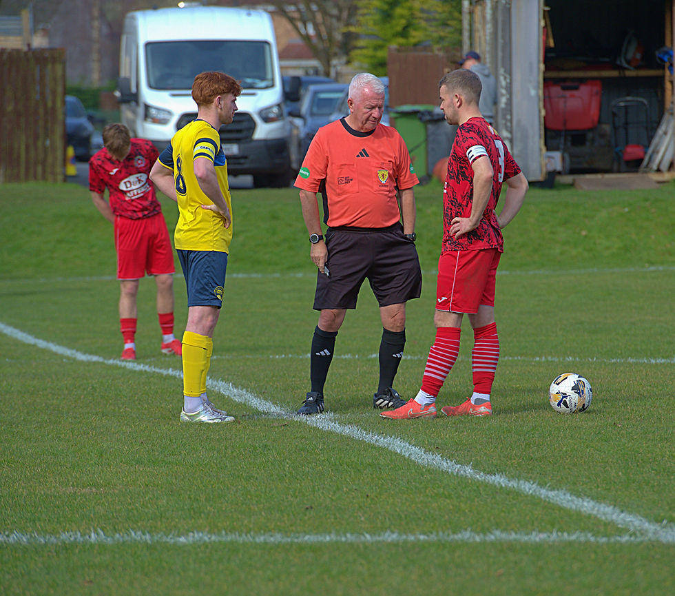 Team Captains Scott Maitland and Ronan McLaughlin with Referee John Cairney