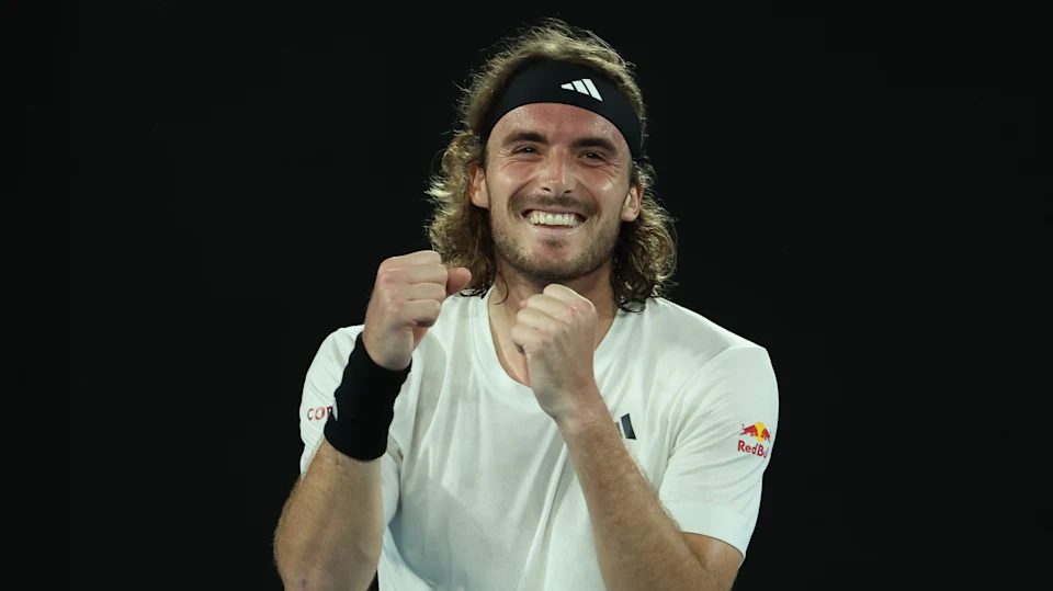 Stefanos Tsitsipas celebrating with both his hands in fist in front of him. 