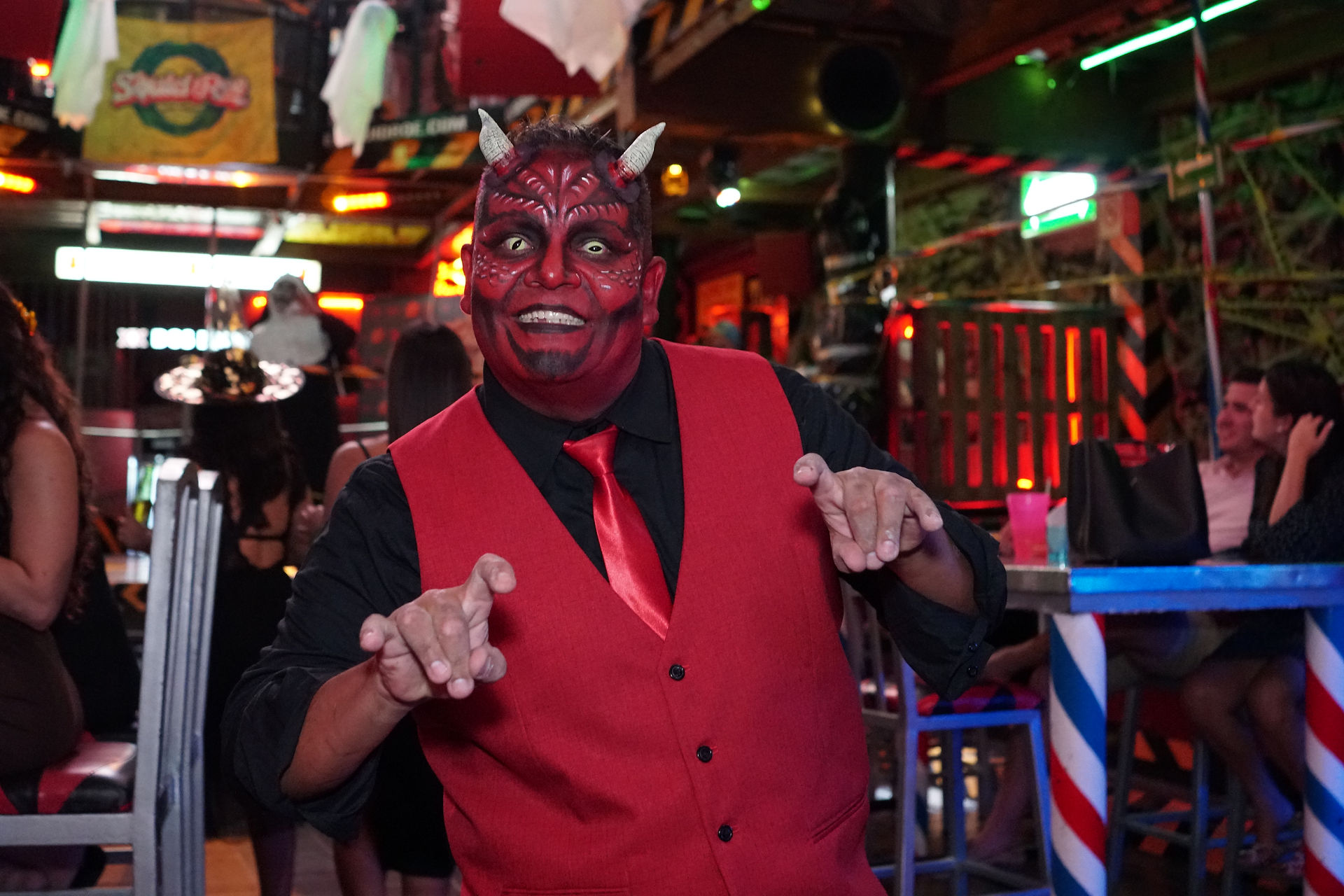 Mc Pablo dressed up as a demon for Halloween at El Squid Roe in Cabo, Mexico. 