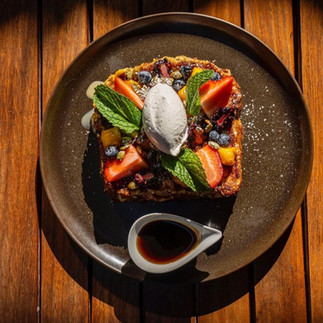 French toast topped with berries, mascarpone cheese and mint leaves from Hoja Santa in Cabo San Lucas, Mexico.