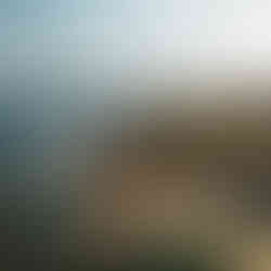 Cabo San Lucas shores, lined with hotels, apartments, and houses.