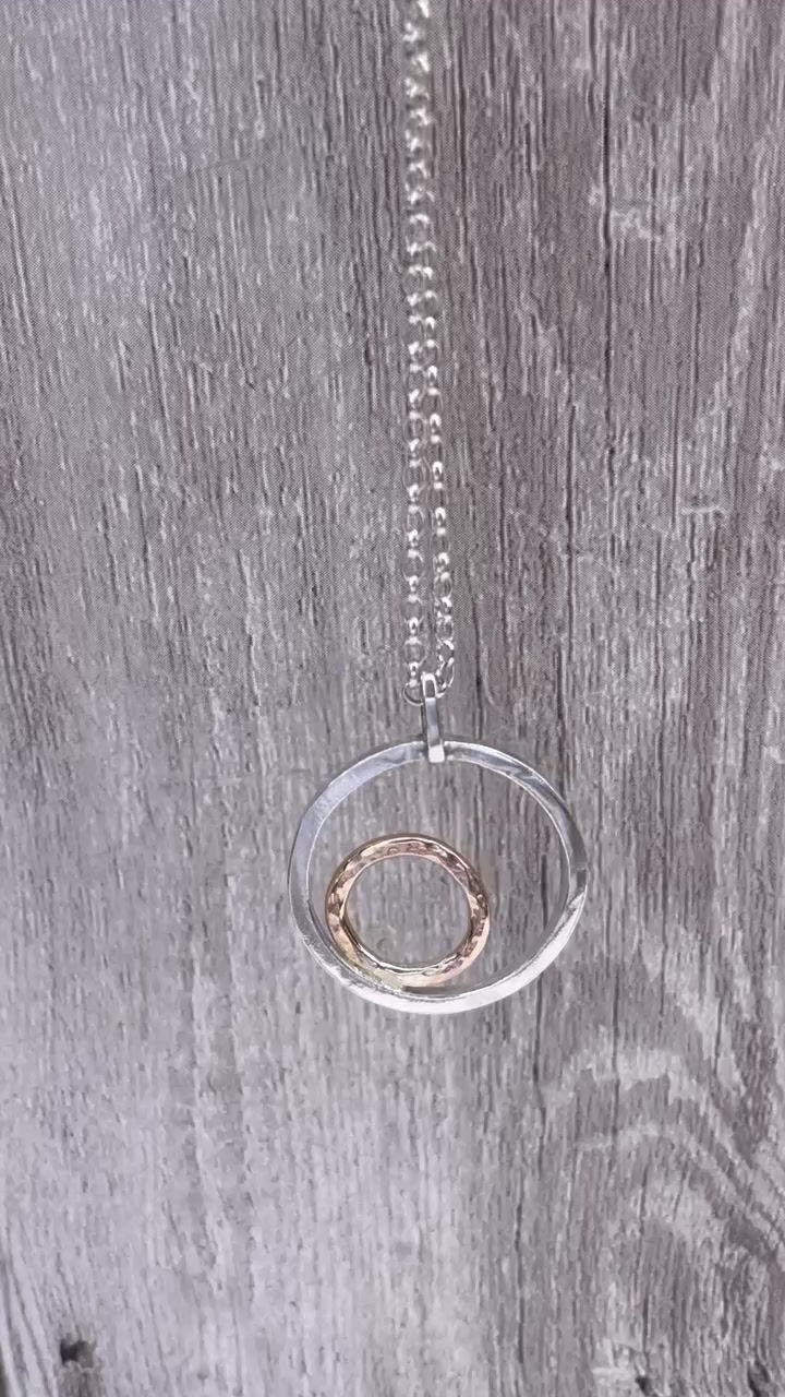 Thumbnail: Taweret Silver and Gold Circles Necklace
