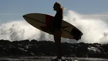 Woman surfing.webp