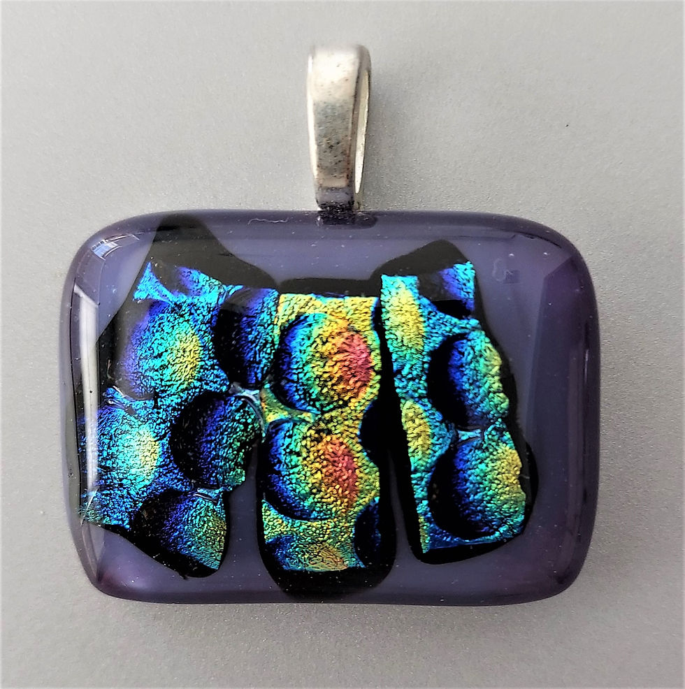 Purple rectangular pendant with "Bubbles"